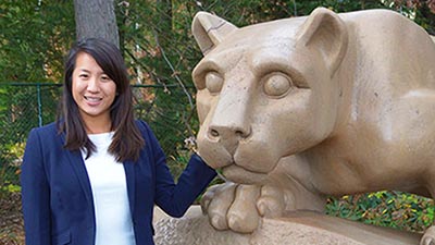Angie Chang with lion shrine