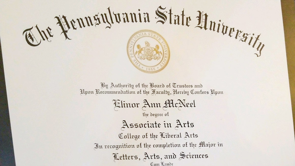 This photograph shows the Penn State diploma that Elinor McNeel received for her associate in arts degree.