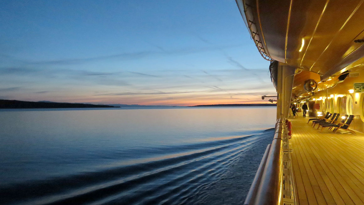 This is a photograph of a cruiseship's deck overlooking the sea