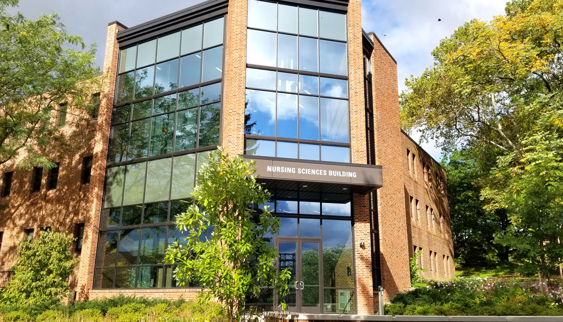 Front of building with sign