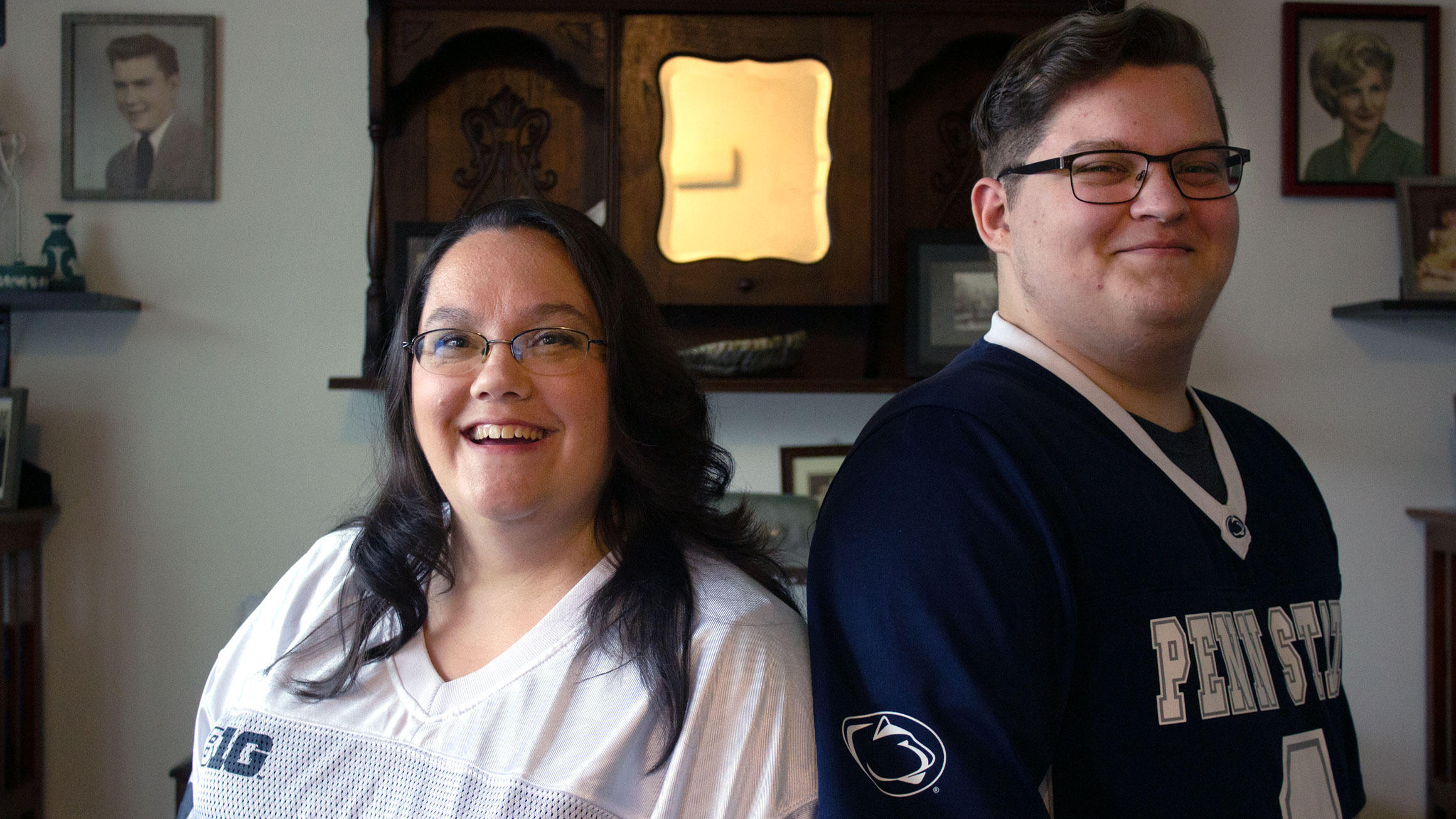 A portrait of Stephanie Files on the left and her son Josh Files on the right with both wearing Penn State football jerseys