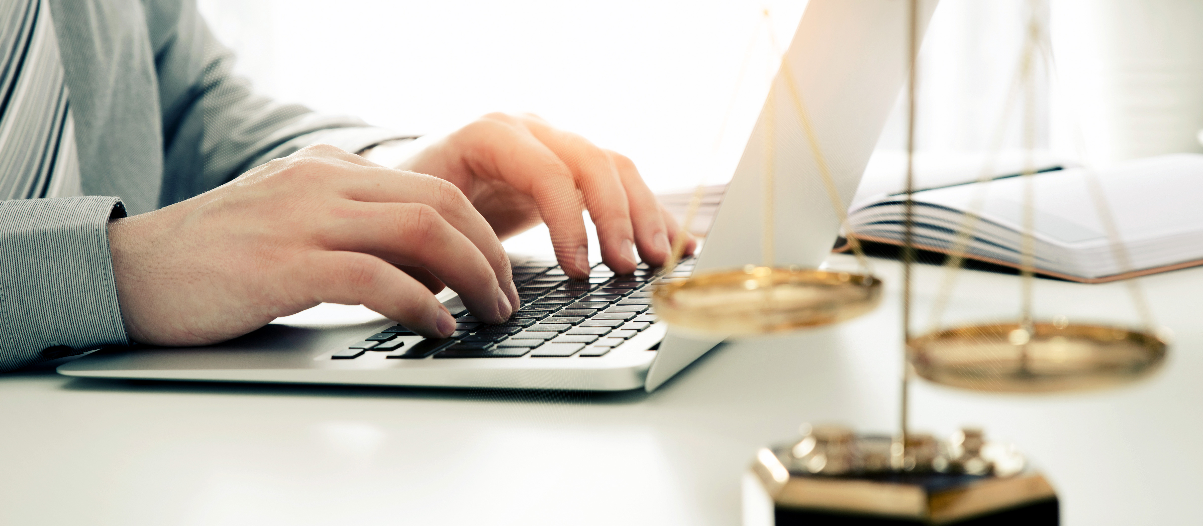 Student typing on keyboard