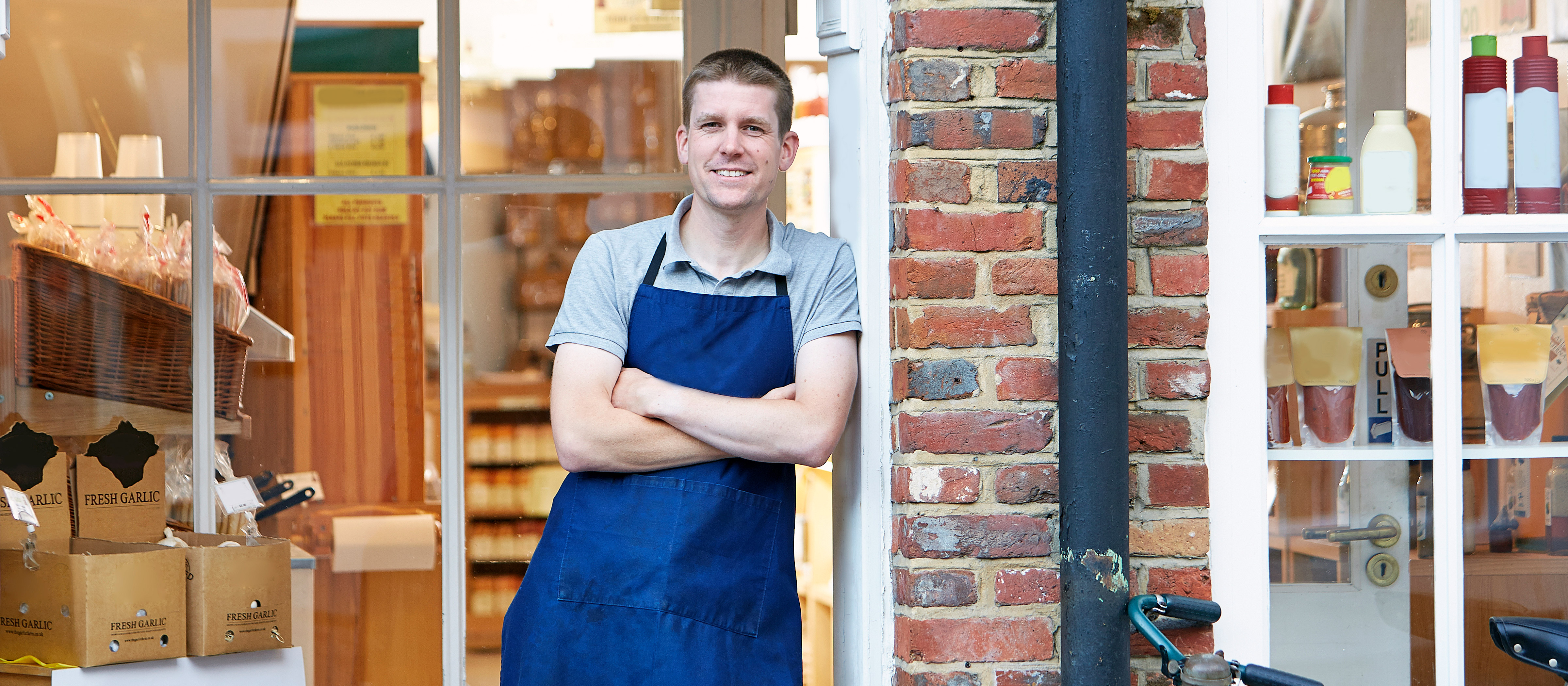 Small business owner outside of shop