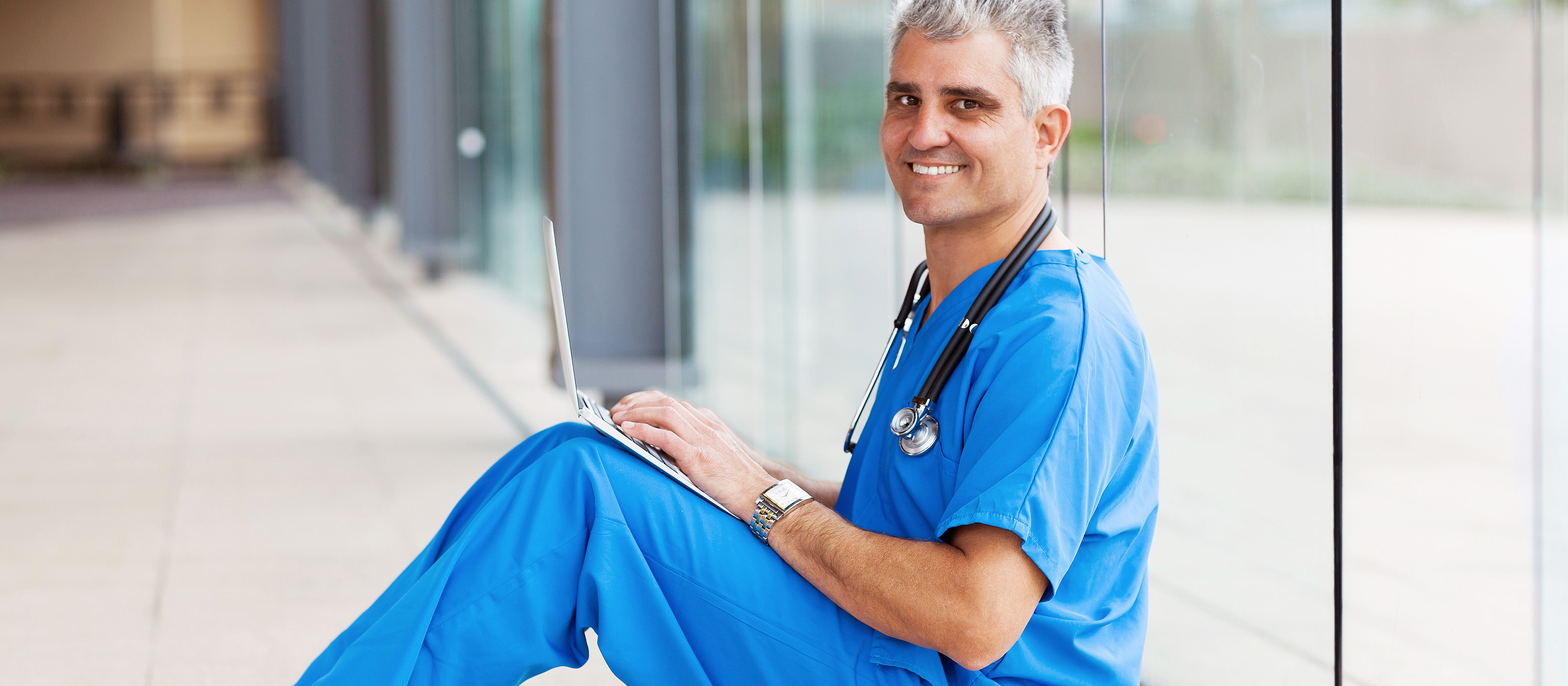 Nurse working on a laptop
