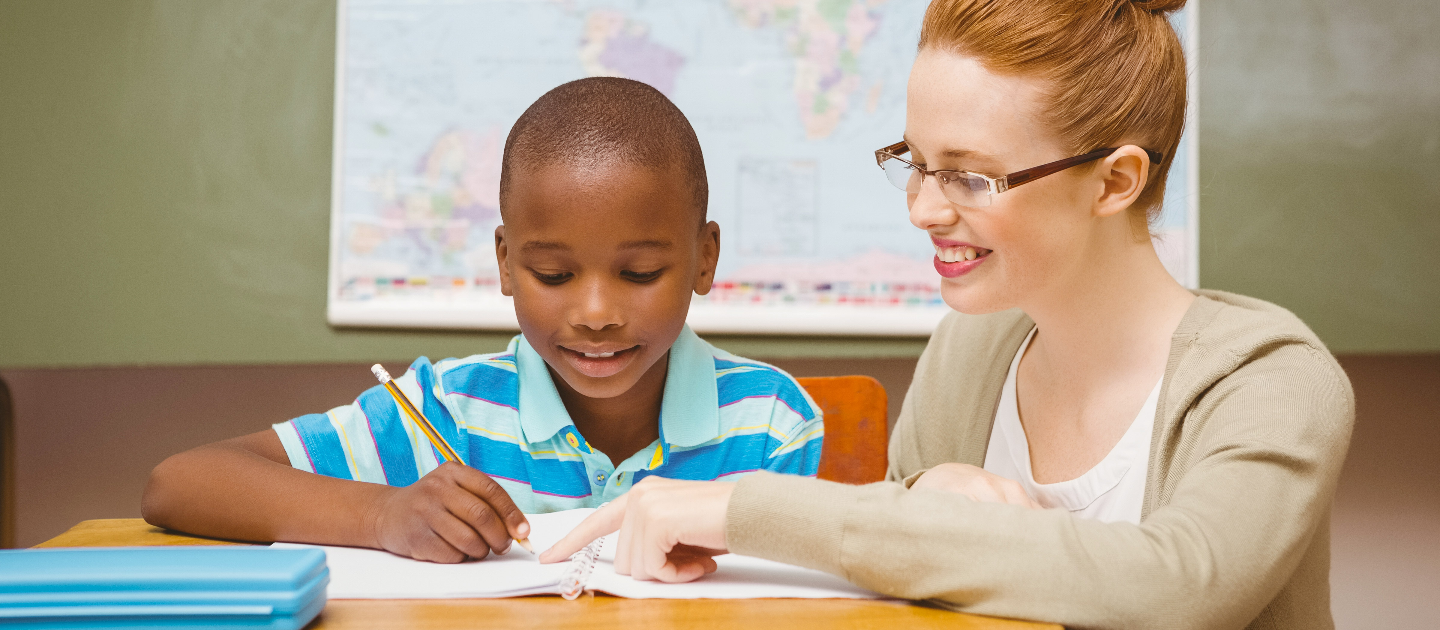 Educator working with a student