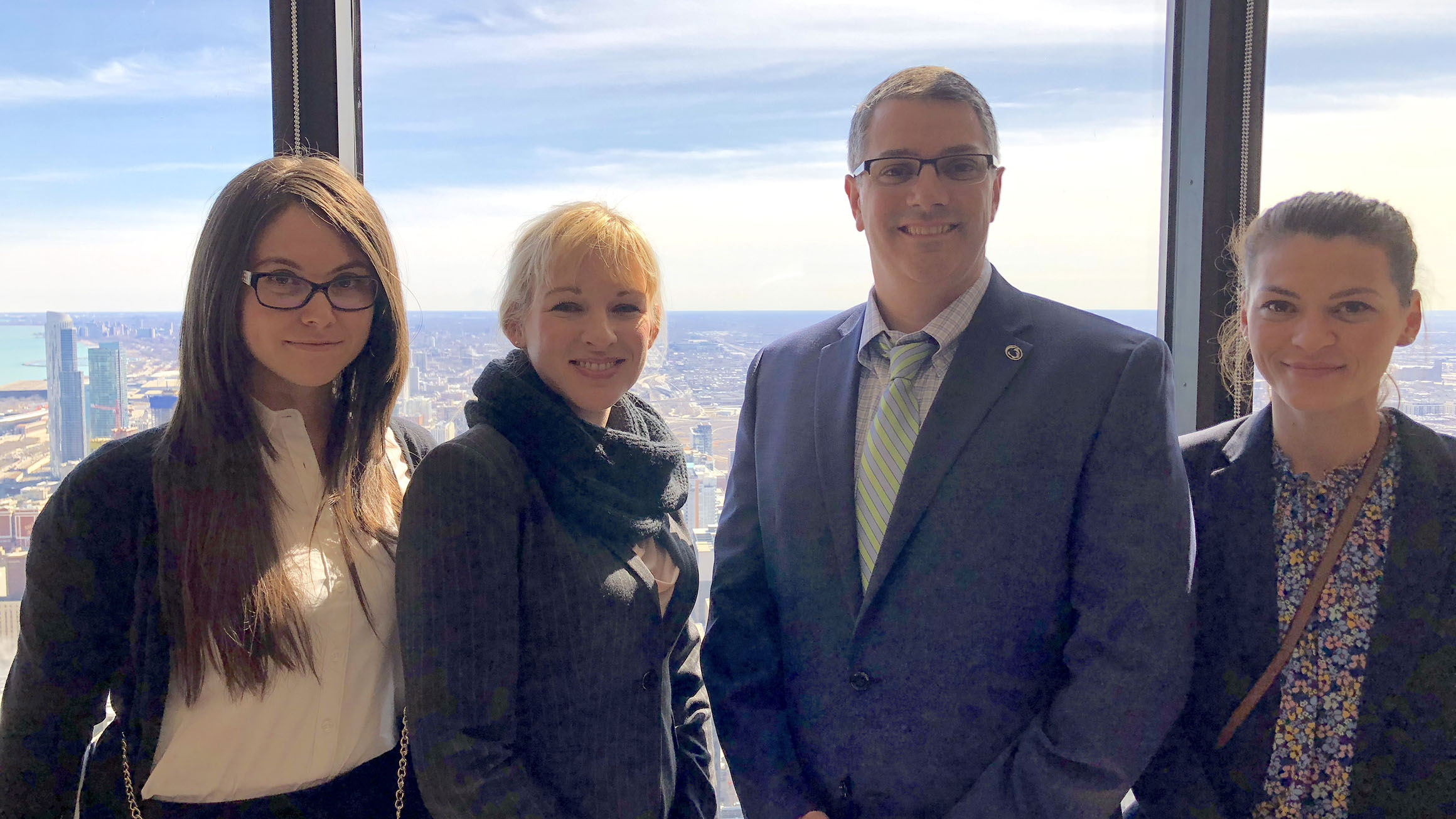 Eric Robbins, with Penn State students on a trip to the TD Ameritrade Conference in Chicago in 2018