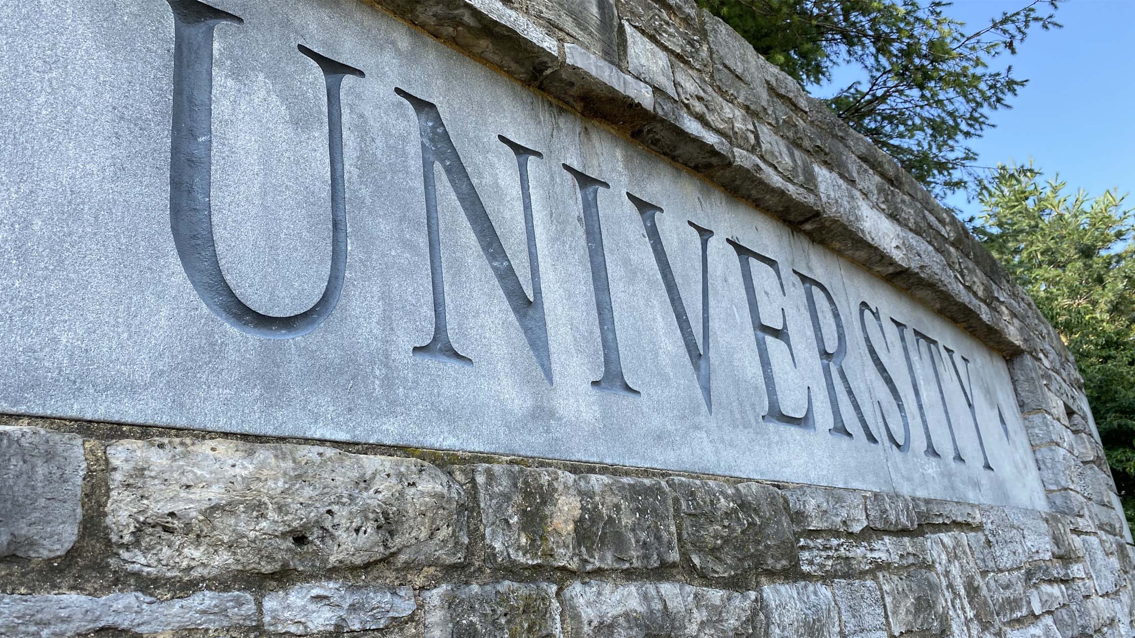 The "University" of the "Pennsylvania State University" sign is shown.