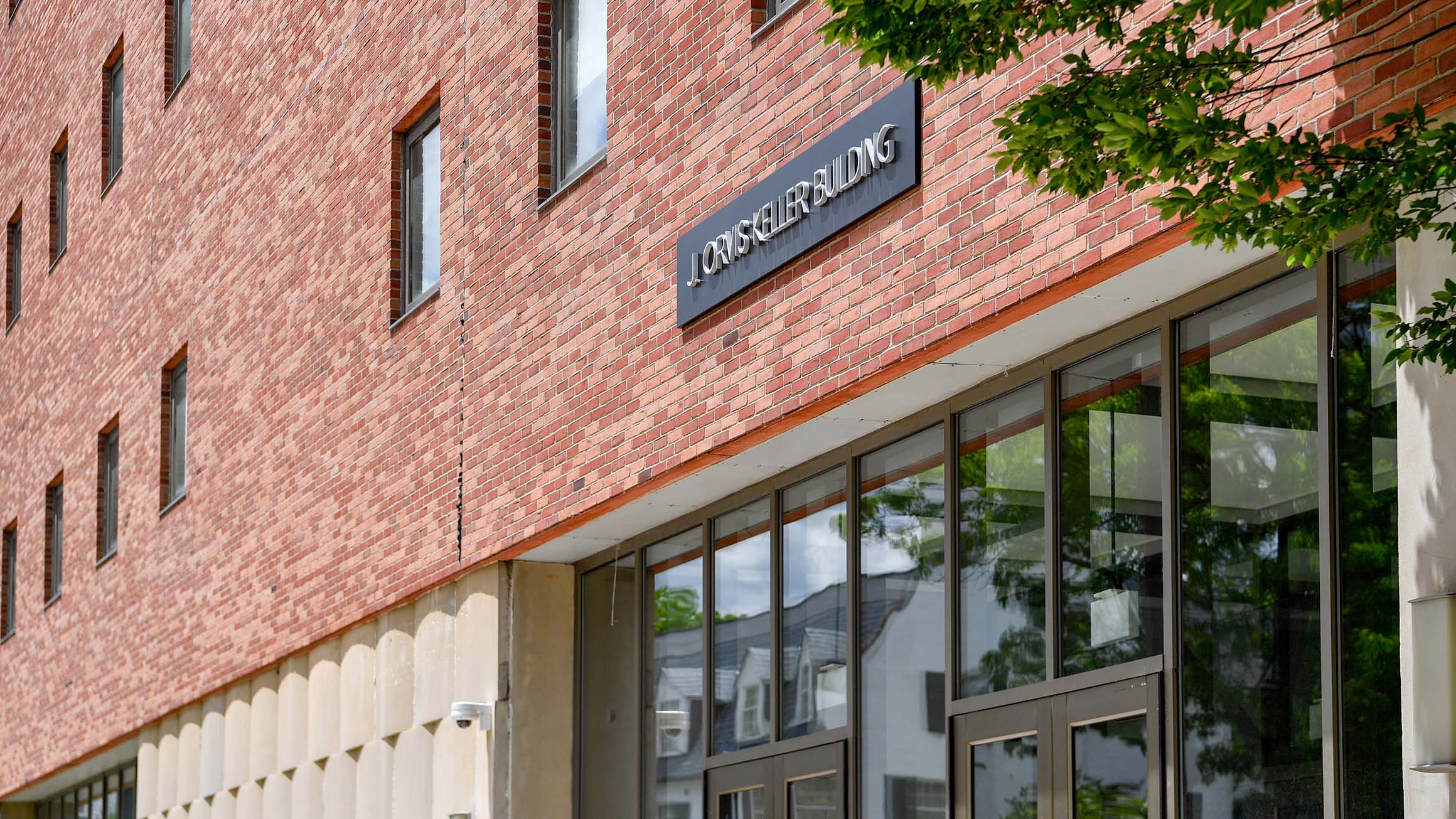 The Orvis J. Keller Building sign is shown on a brick edifice.