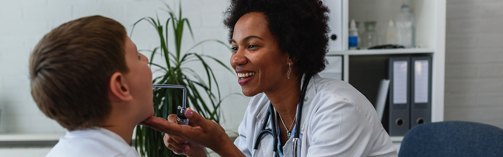 Nurse Practitioner working with a patient