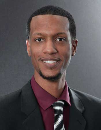 A headshot of Kyle Harmon