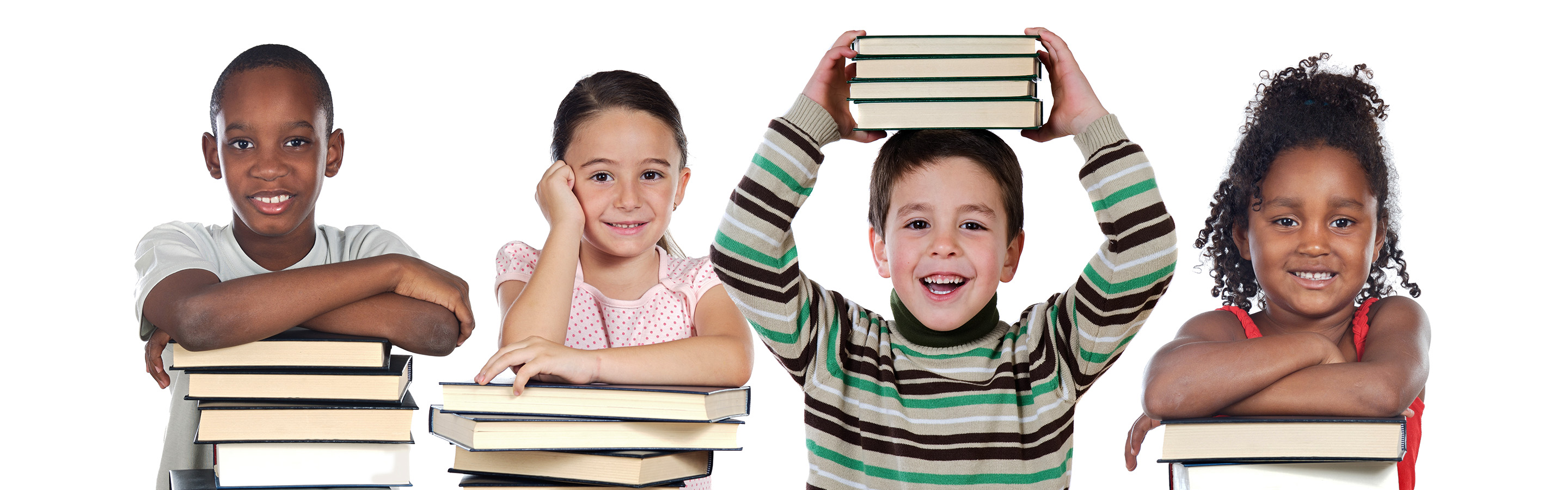 Four children holding stacks of books