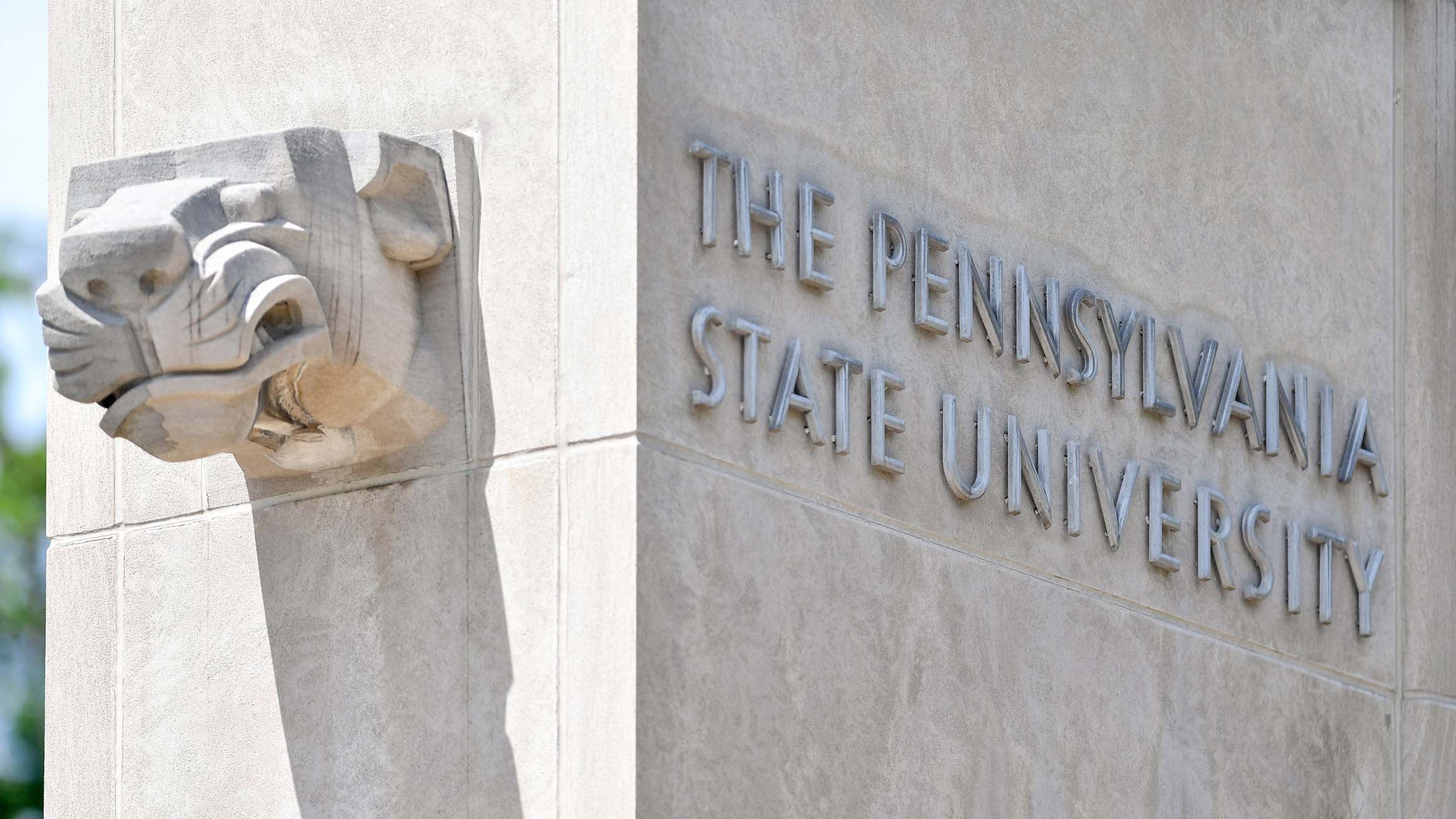 The gates of the university are shown, with the text "The Pennsylvania State University"