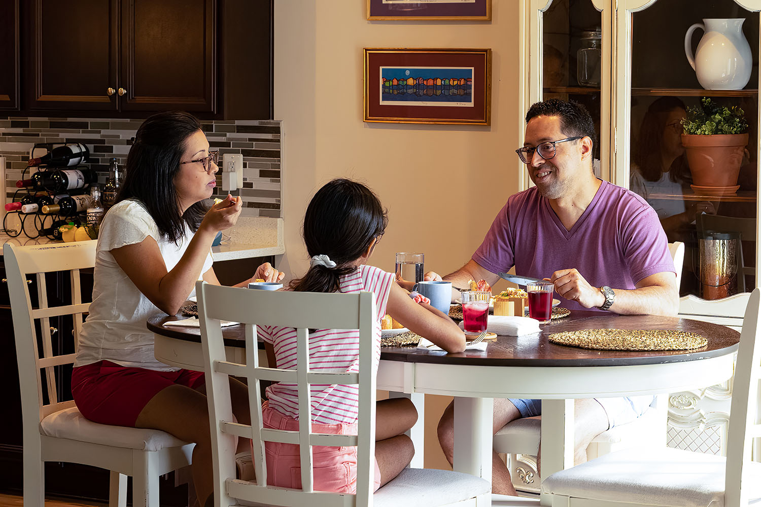 Roberto Rodriguez and his family sharing a meal together