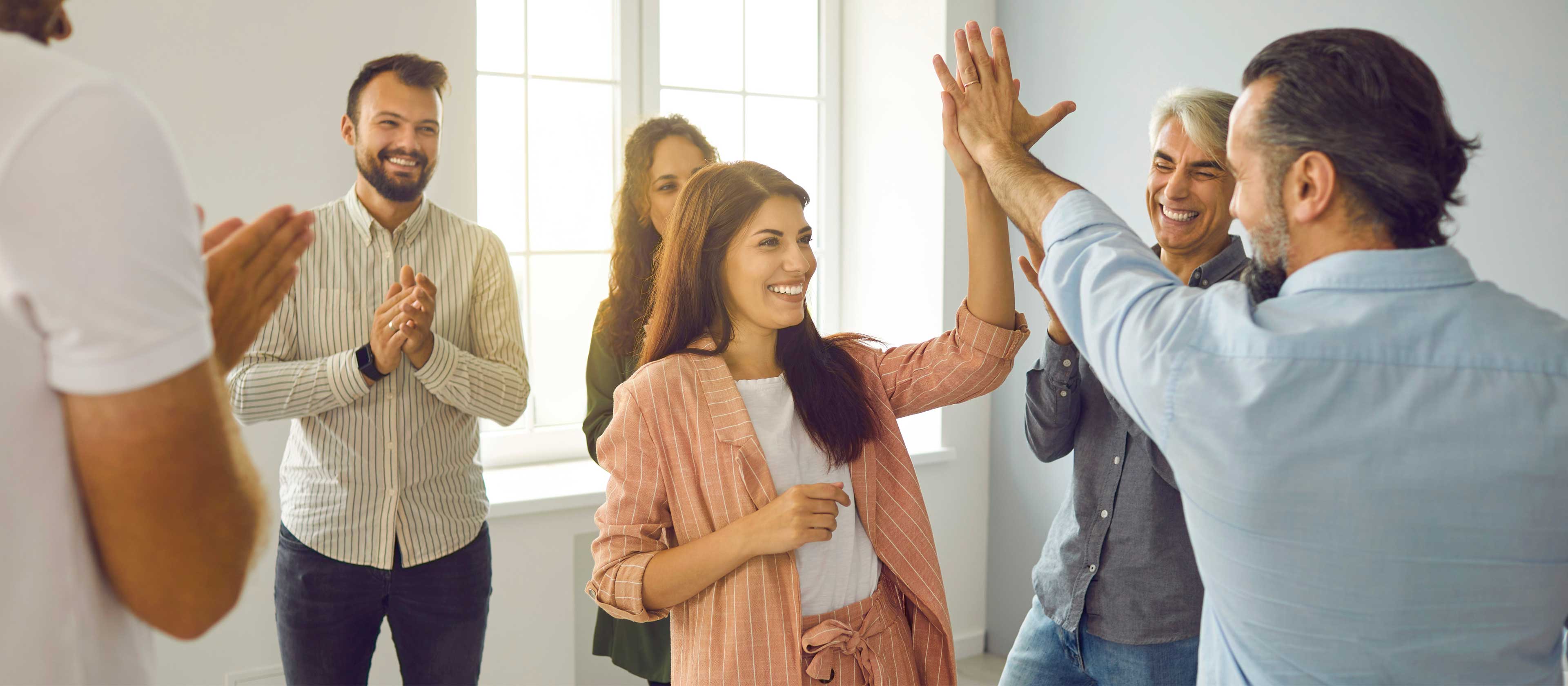 LHR professionals high five 