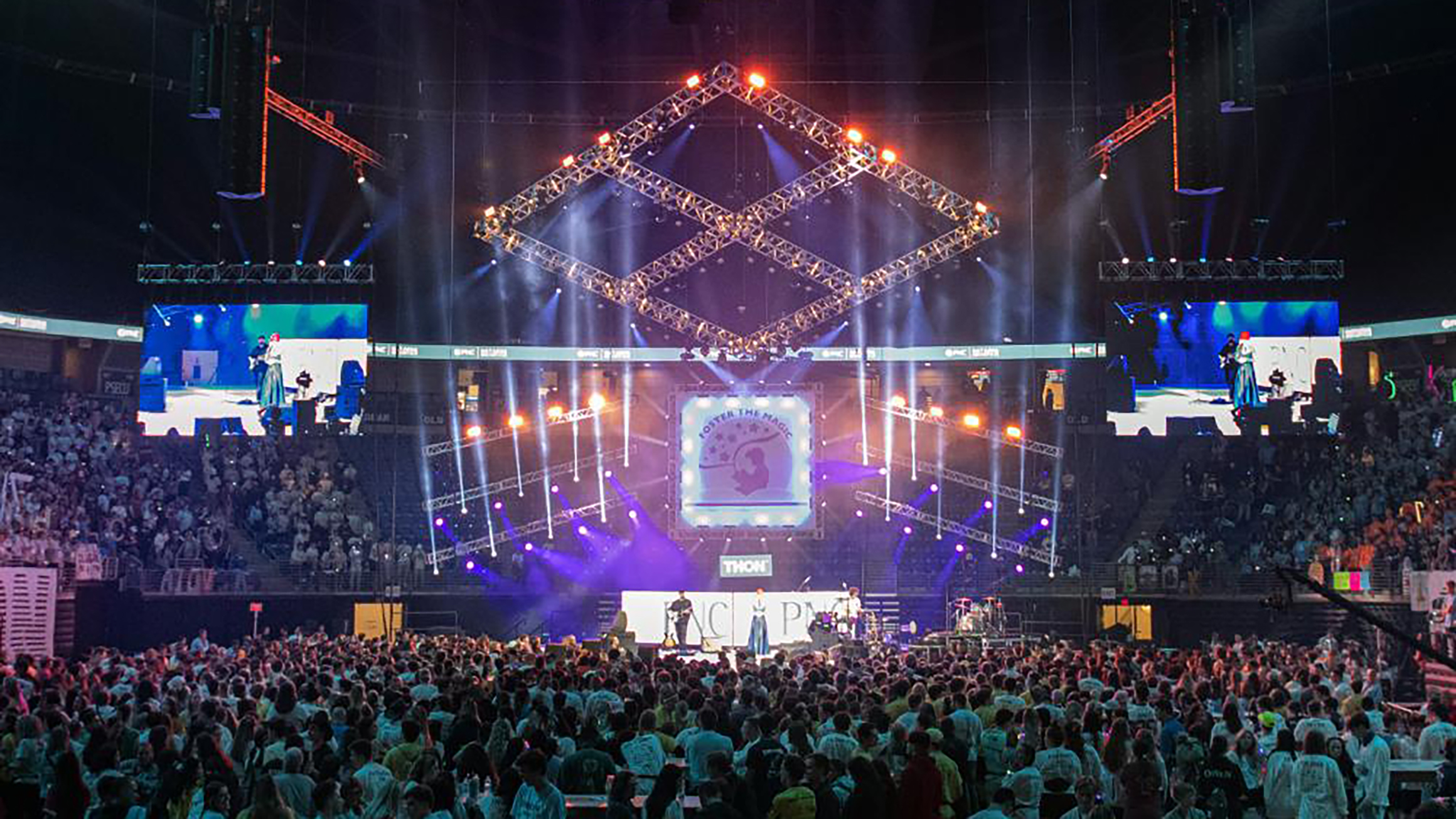 A photo of the THON stage and dancers in the Bryce Jordan Center.