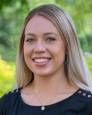 A headshot of Katie Burke.