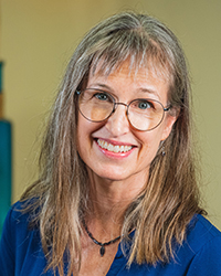 A headshot of Elisa Hopkins.