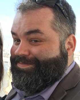 A headshot of Bryan Parent.