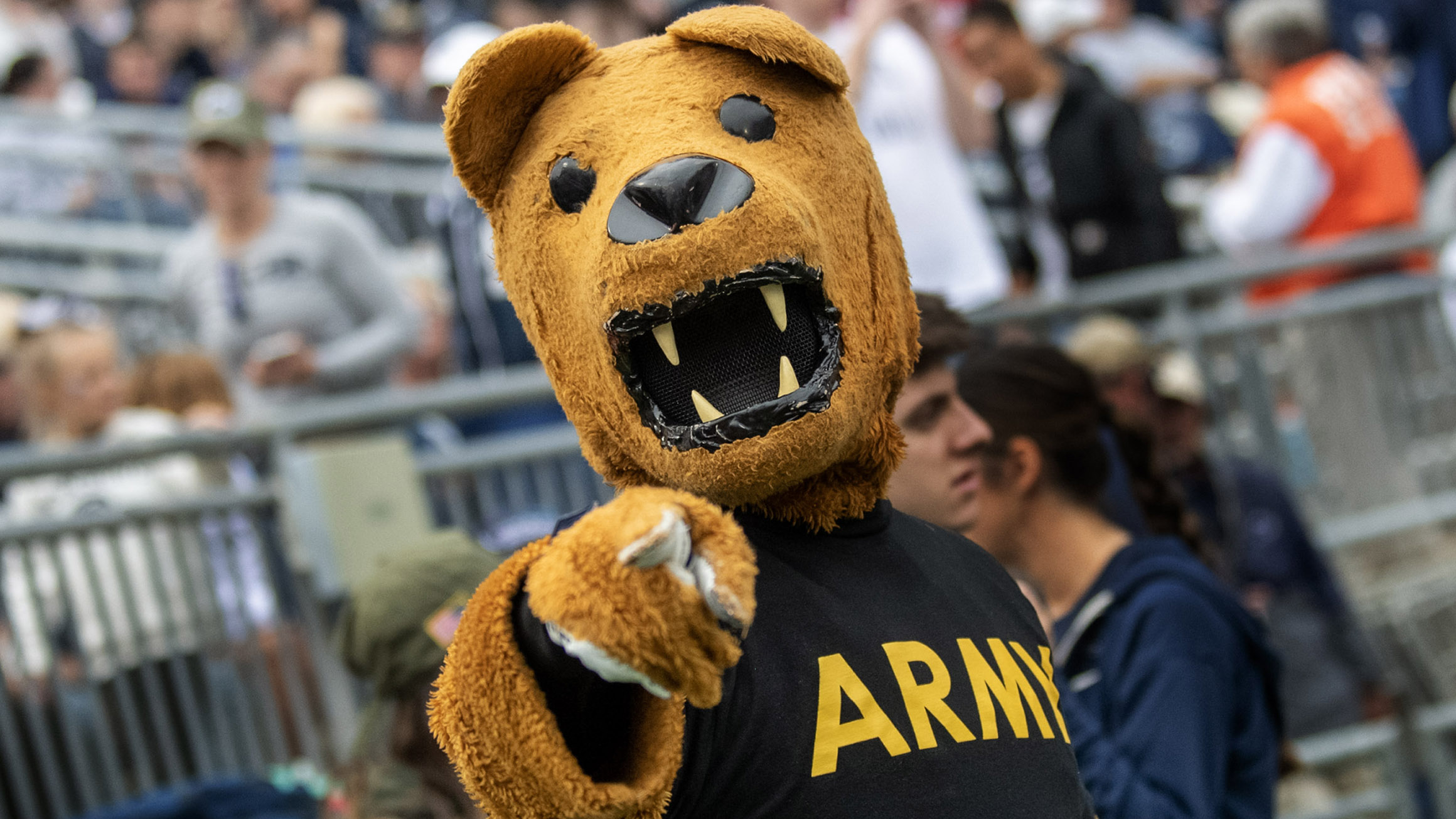 The Nittany Lion mascot wears an Army t-shirt