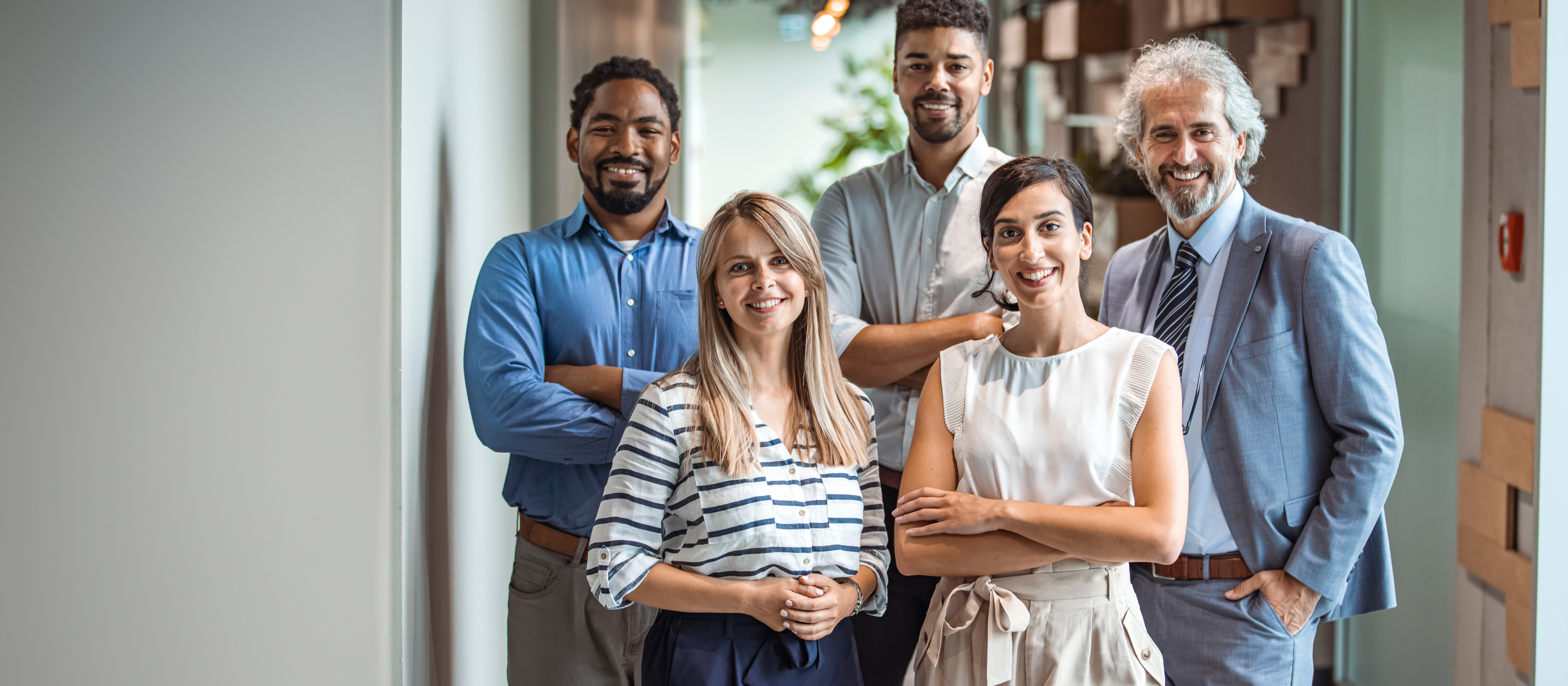 group of adults smiling at the camera