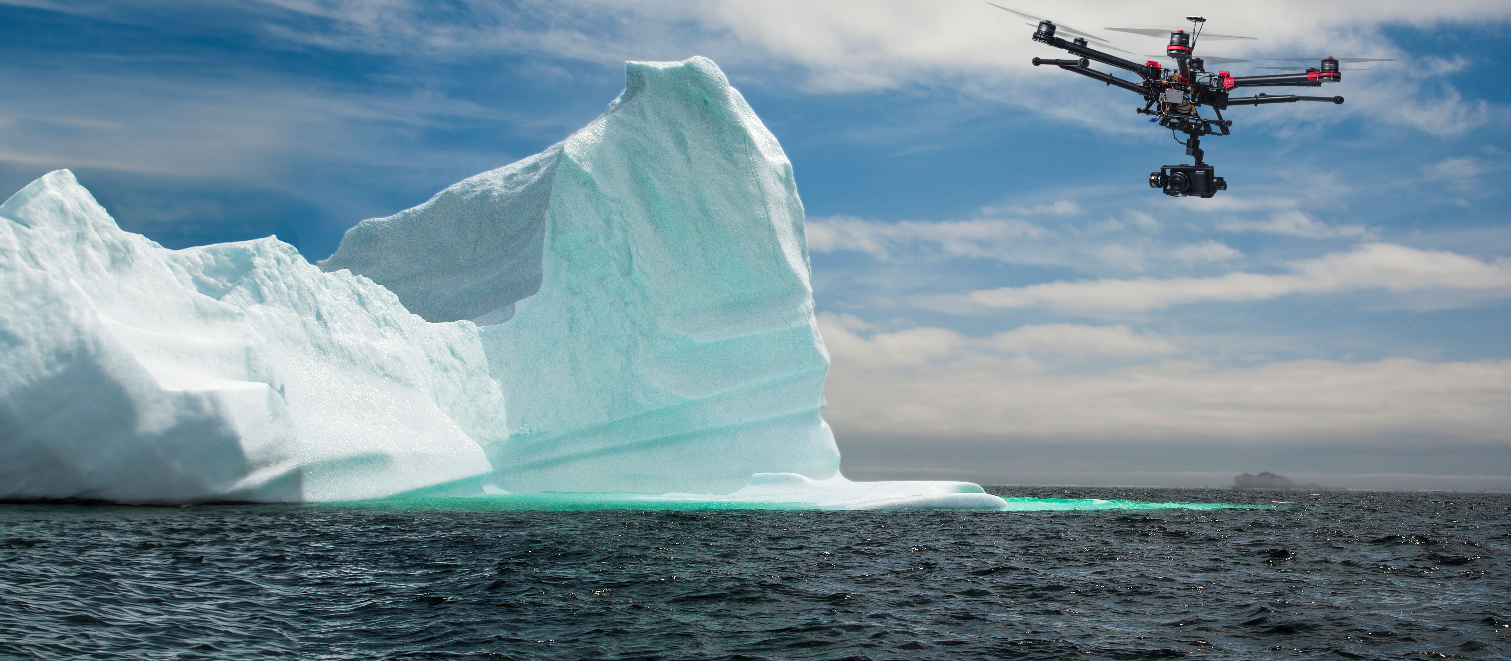 drone flying over an iceberg 
