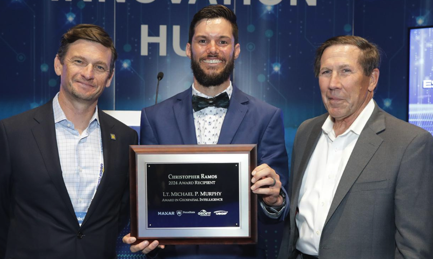 Murphy Award winner holding award