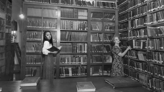 A student created a black and white illustration of a library for an art project.