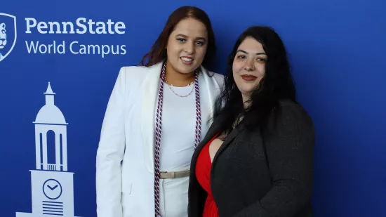 Maria Espinosa and Rachel Foster pose for a photo