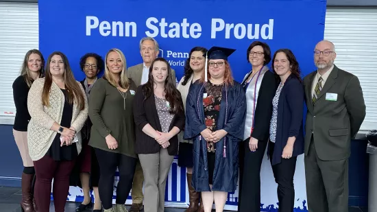 A group of students and staff from the human resources and employment relations program pose for a photo at the graduation celebration.