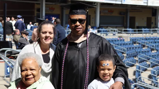 Raphael Cuthbertson II poses with his family