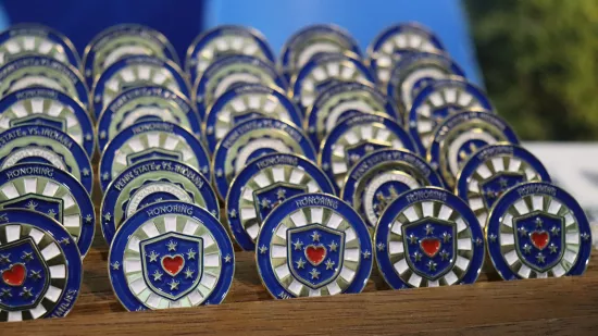 Military challenge coins are displayed.