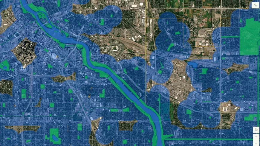 A color-coded map showing a bird's eyeview of a town with a river running through it