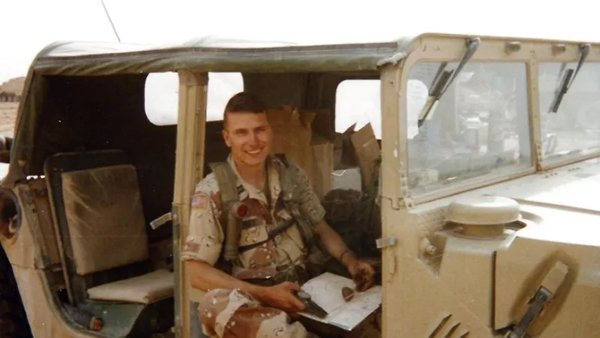 Service member in military vehicle